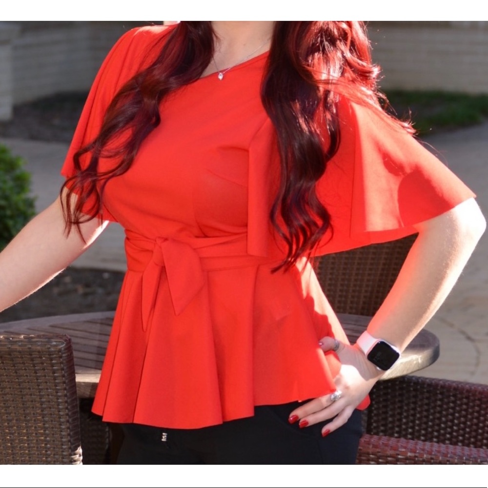 Red shirt with flowing bell sleeves
